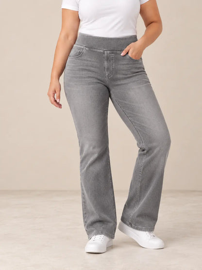 Pantalón Cashia Denim 200 color gris, talla XL, vista frontal de medio plano inferior sobre modelo con camiseta blanca y zapatillas blancas.
