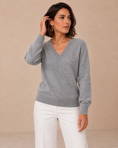 Jersey Cashia Cedro gris de manga larga y escote de pico, talla M, medio plano superior sobre modelo.