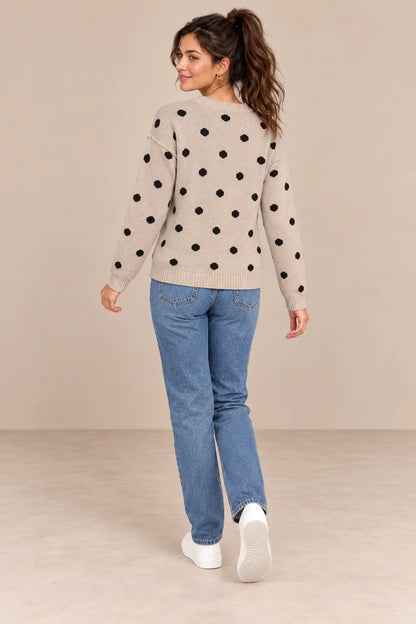 Espalda del jersey Cashia Haya beige con lunares negros, talla S, con bajo y puños de canalé.