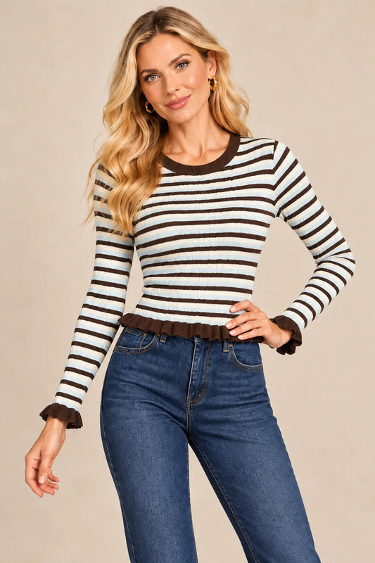 Jersey Cashia Hayedo tricolor, talla S, medio plano superior de modelo rubia, con cuello redondo y acabados marrones.
