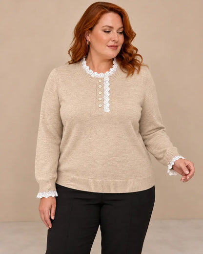Jersey de mujer con encaje en cuello y puños de Cashia Sauco, color beige, detalles elegantes y cómodos.