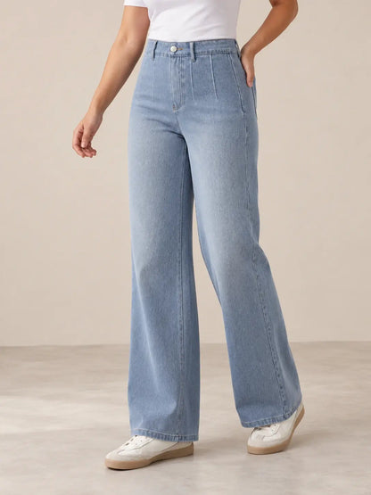 Pantalón Cashia Denim 401 denim claro, talla M, medio plano inferior sobre modelo, con tiro alto y pernera ancha