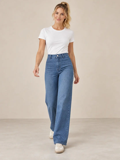 Pantalón Cashia Denim 401 azul medio, talla S, vista frontal sobre modelo rubia con coleta alta y camiseta blanca.