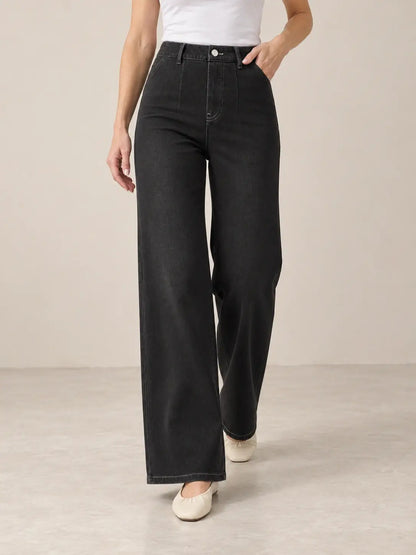 pantalon-cashia-denim-401-negro-s-medio-plano-inferior.webp	Pantalón Cashia Denim 401 negro, talla S, medio plano inferior sobre modelo, con tiro alto y pernera ancha.