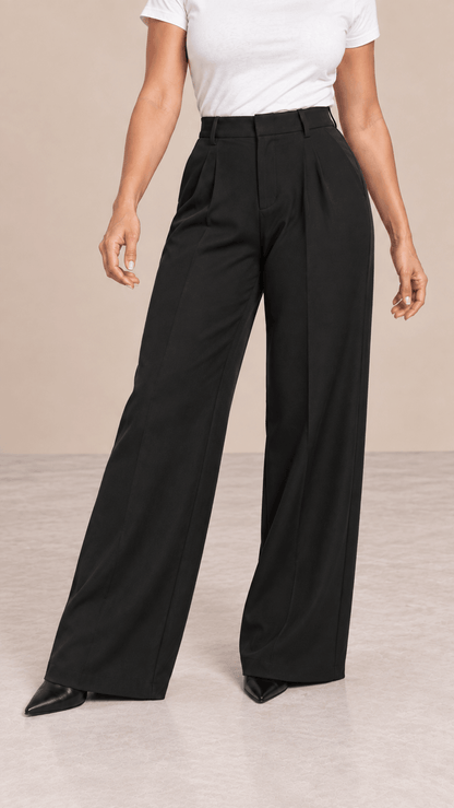 Pantalón Cashia Flow negro talla M en medio plano inferior desde la cintura hasta los zapatos