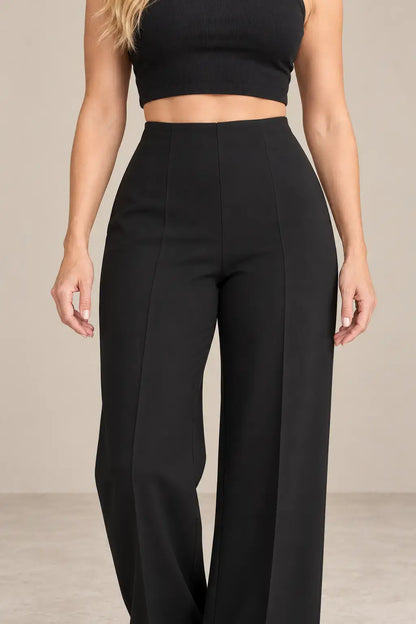 Pantalón de mujer tiro alto pierna amplia de Cashia Spire, elegante y atemporal en color negro.