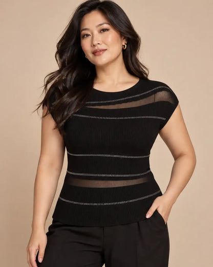 Top Cashia Ferrara negro en talla L, medio plano superior, punto calado con strass y modelo Cashia L de pelo suelto.