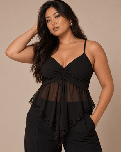 Top Cashia Lucca negro en talla L, con escote en V, cuerpo de gasa semitransparente y bajo asimétrico de encaje.